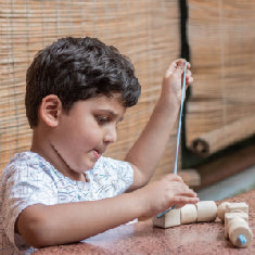 Why is fine motor skill development essential in growing children?