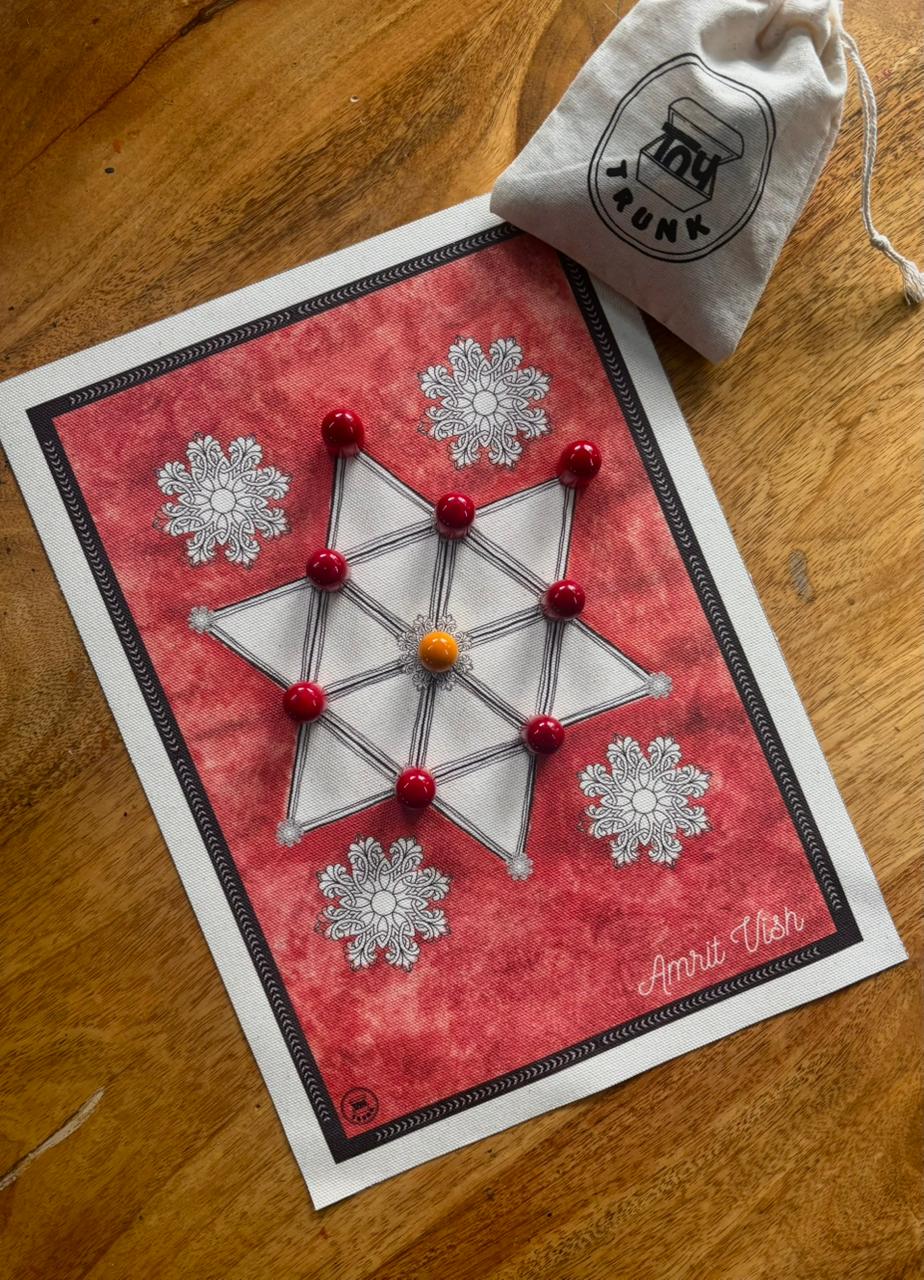 Amrit Vish traditional Indian strategy board game with canvas board and wooden pegs.