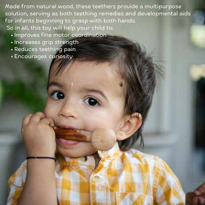 Baby using The Toy Trunk Wooden Dumbbell Teether for teething relief, grip strength, sensory play and safe chewing