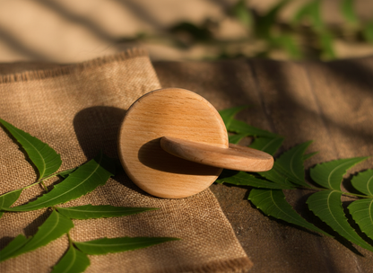 Wooden interlocking disc for sensory play and fine motor exploration.