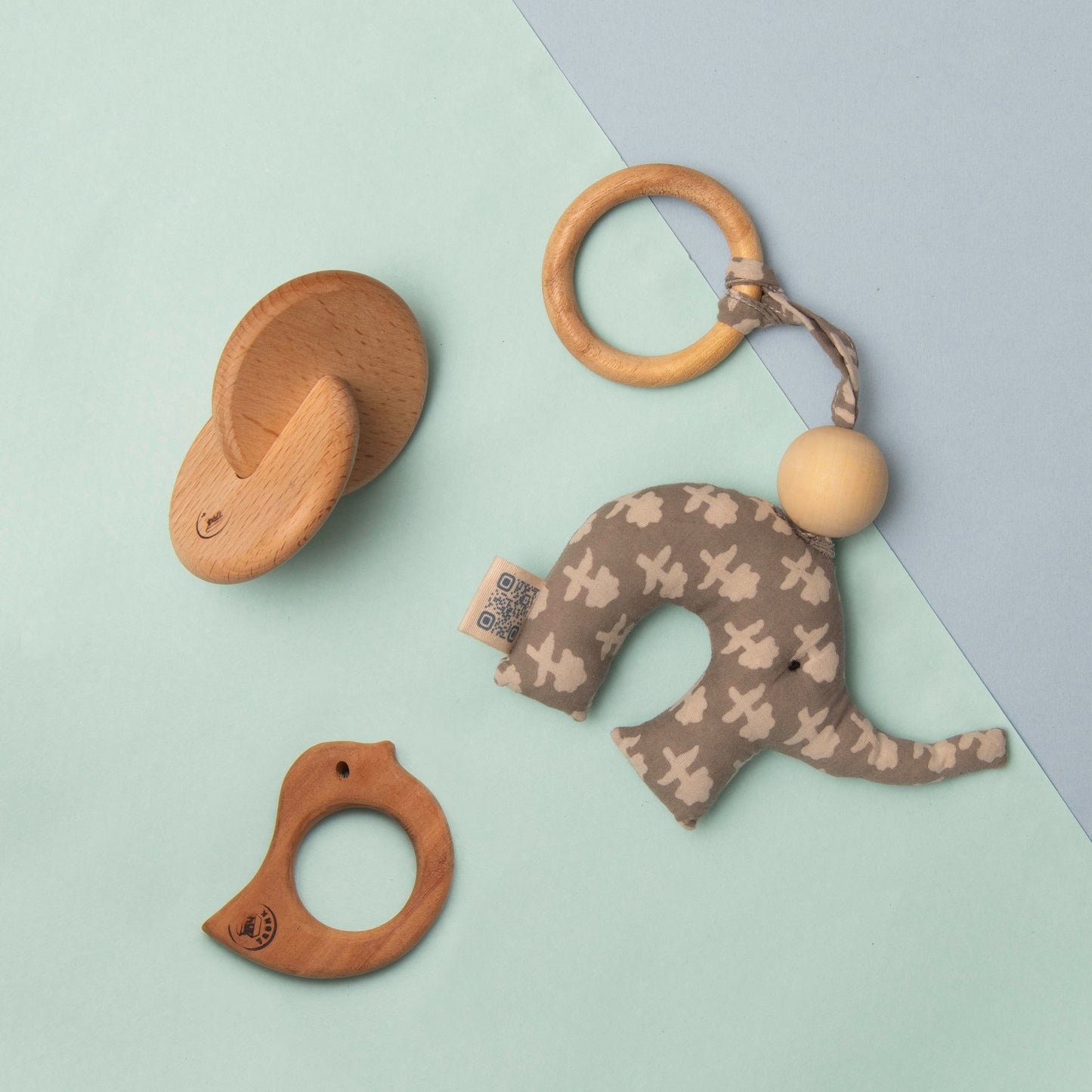 Interlocking disc teether, bird teether & fabric elephant from Newborn Sensory Starter Kit, safe soft sensory toy for babies 0–12 months.