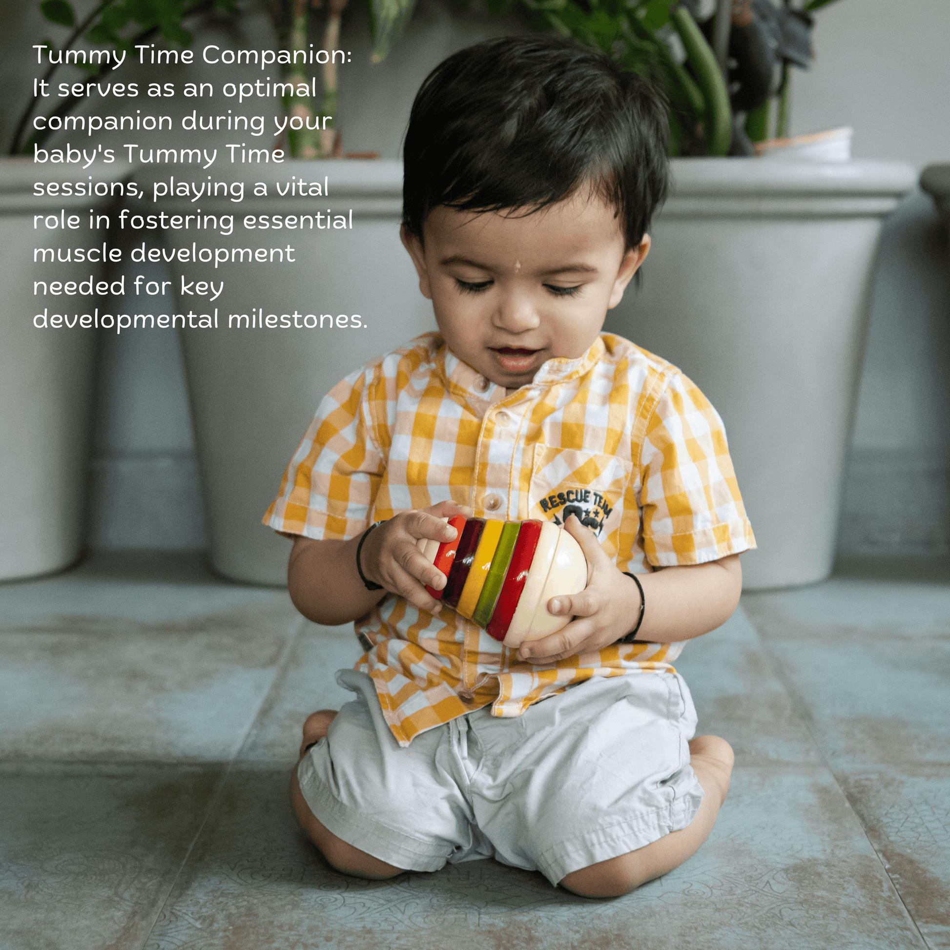 Child playing with Wooden Pear Wobbler, Montessori-inspired toy for motor skills and sensory play.