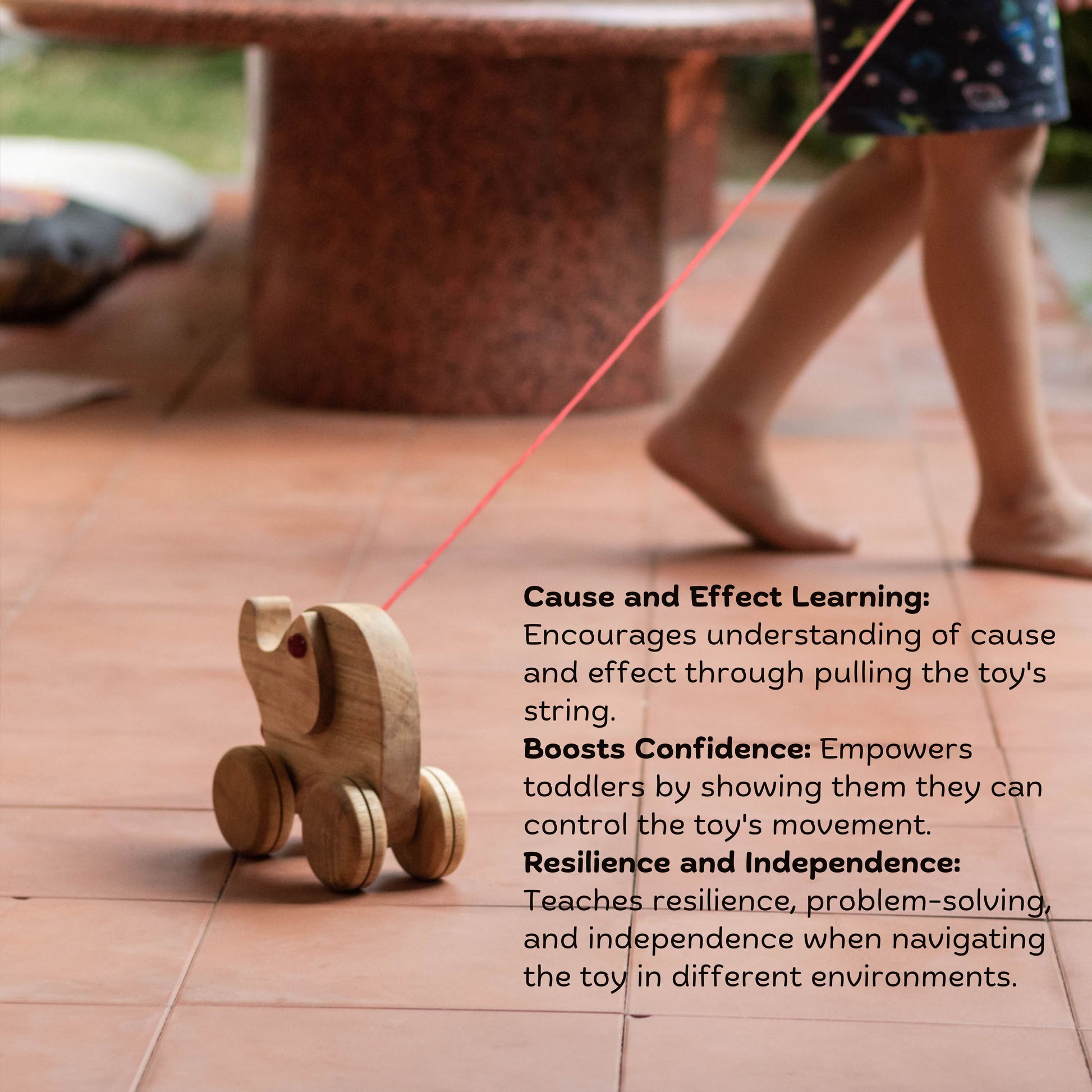 Kid playing with Wooden Ellie the Elephant – Montessori-inspired pulling & lacing toy for toddlers, enhancing problem-solving, sensory & motor skills with benefits 