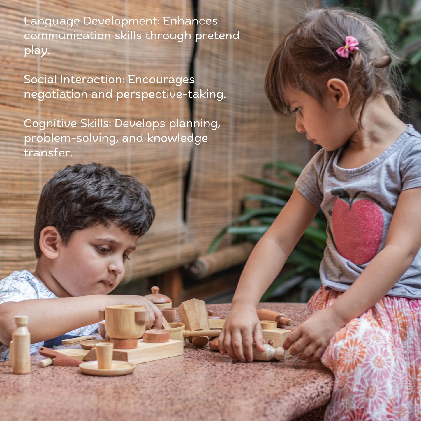 Boy & girl playing with Wooden Kitchen Set – safe, eco-friendly Montessori role play toy enhancing language, teamwork & cognitive skills