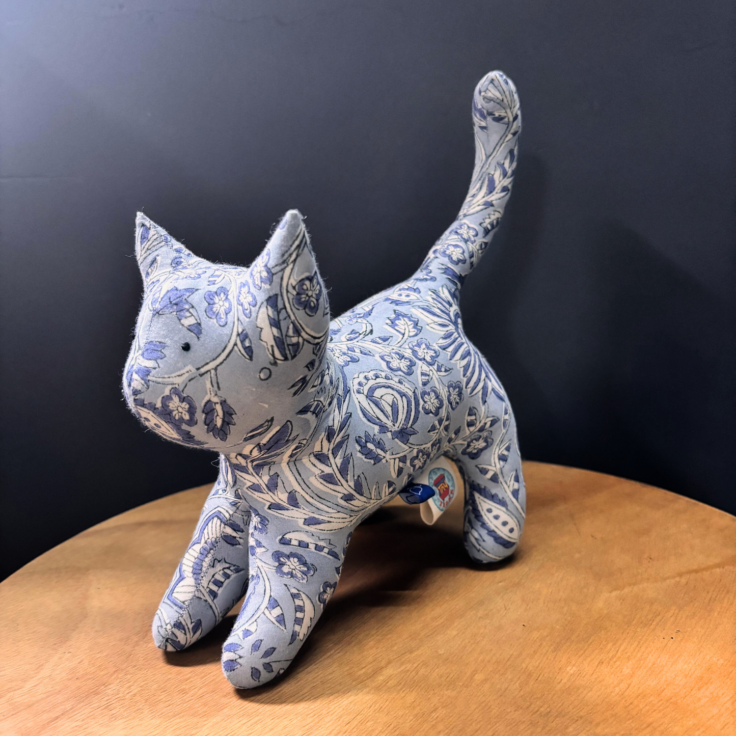 KiKi Kat Indian handblock-print soft toy in blue and white floral fabric.