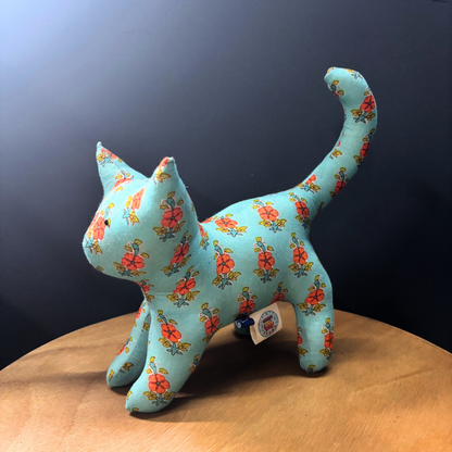 KiKi Kat toddler cuddle toy in teal and orange handblock-print cotton fabric.