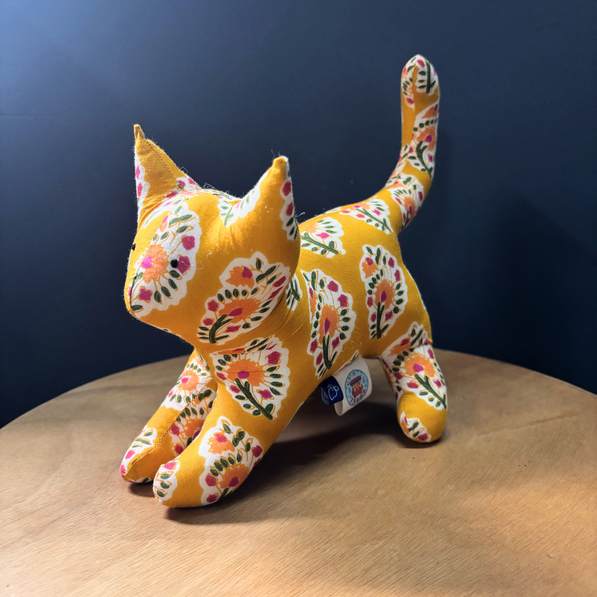 KiKi Kat cotton soft toy in yellow floral handblock print for toddlers.
