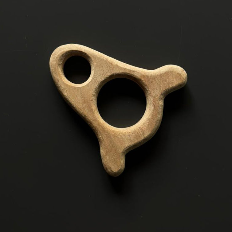 Neem wood teether from Wooden Playful Trio Baby Set for teething relief.