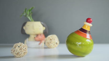 Watch The Toy Trunk Wooden Globe Wobbler for kids in action – handmade neem wood wobbling toy for tummy time & crawling practice