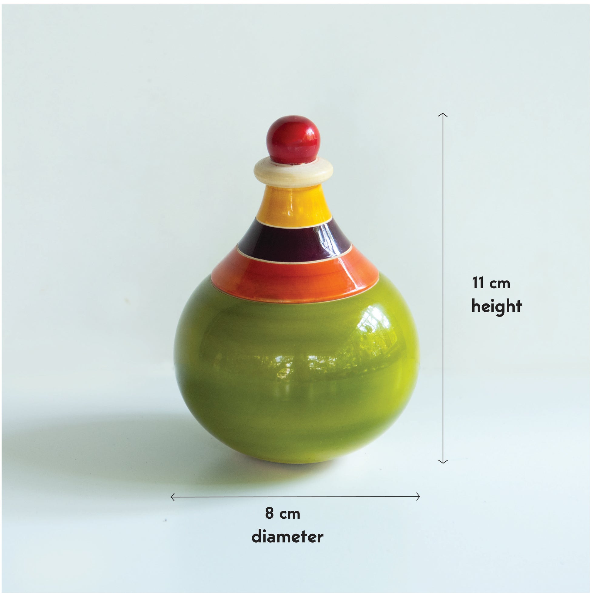 Wooden globe wobbler measurement details for babies 0–12 months.