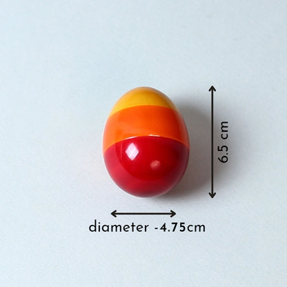Measurement and size guide of the wooden egg rattle from The Toy Trunk, a compact wooden rattle toy suitable for infant sensory play and fine motor development.