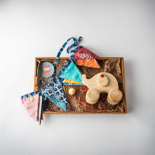 Wooden Fun Time Combo with Ellie Elephant pull toy and fabric bunting for toddlers.