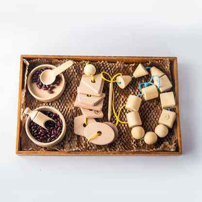 Wooden Giant Montessori Box The Toy Trunk – bowls with spoons, threading shapes and lacing beads for kids 3+
