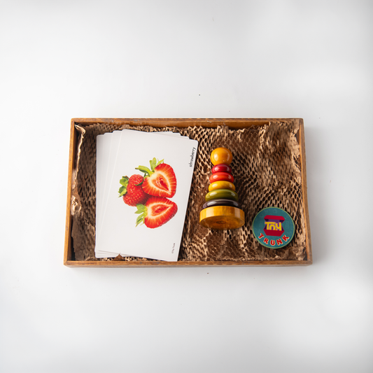 Wooden Learn and Stack Discovery Kit with ring stacker and vegetable flash cards for toddlers.