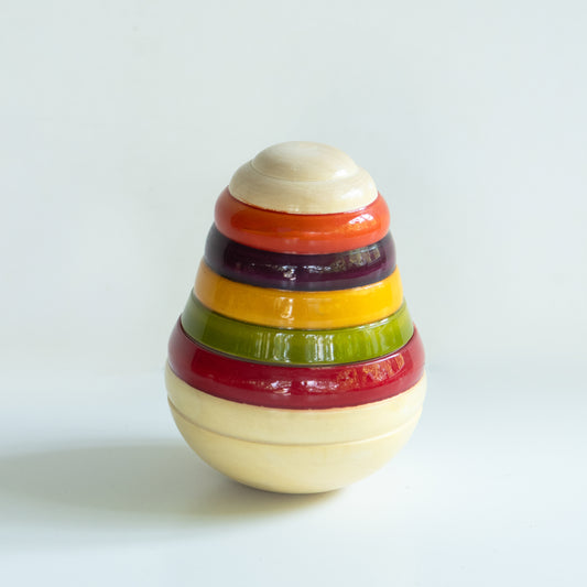 Wooden Pear Wobbler for babies by The Toy Trunk, tummy time and crawling motivation toy.