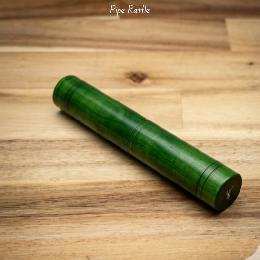 Green lacquer finish wooden pipe rattle for babies.