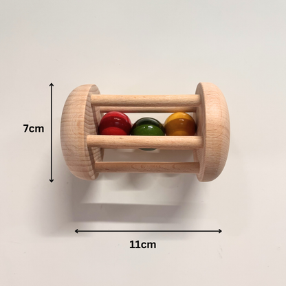 Wooden rolling rattle measurement details showing 7cm height and 11cm length.