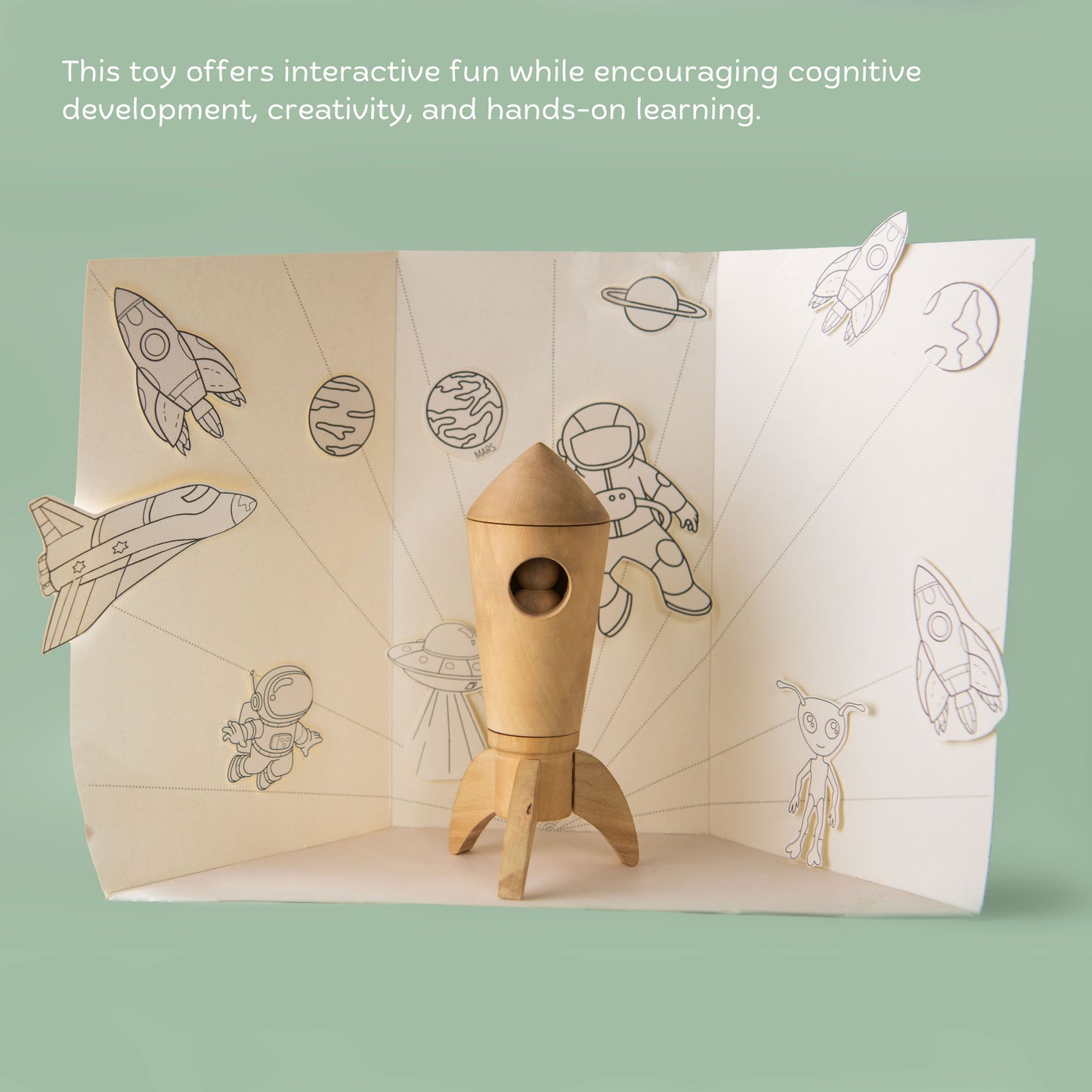 Paintable outer-space backdrop included with Wooden Space Rocket DIY Toy for kids.
