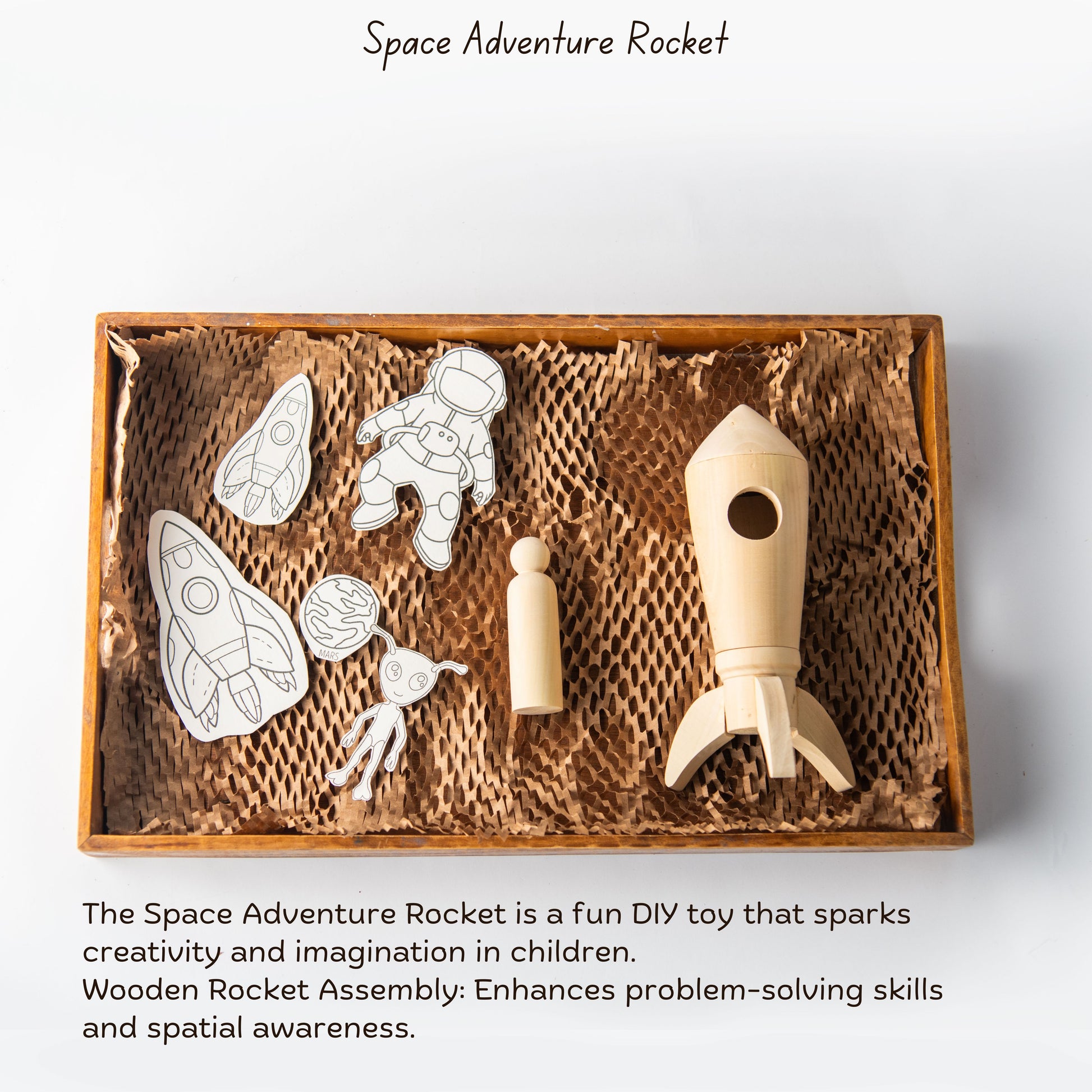 Wooden Space Adventure Rocket DIY toy set with rocket, astronaut peg doll, and paintable space-themed backdrop for kids aged 5+