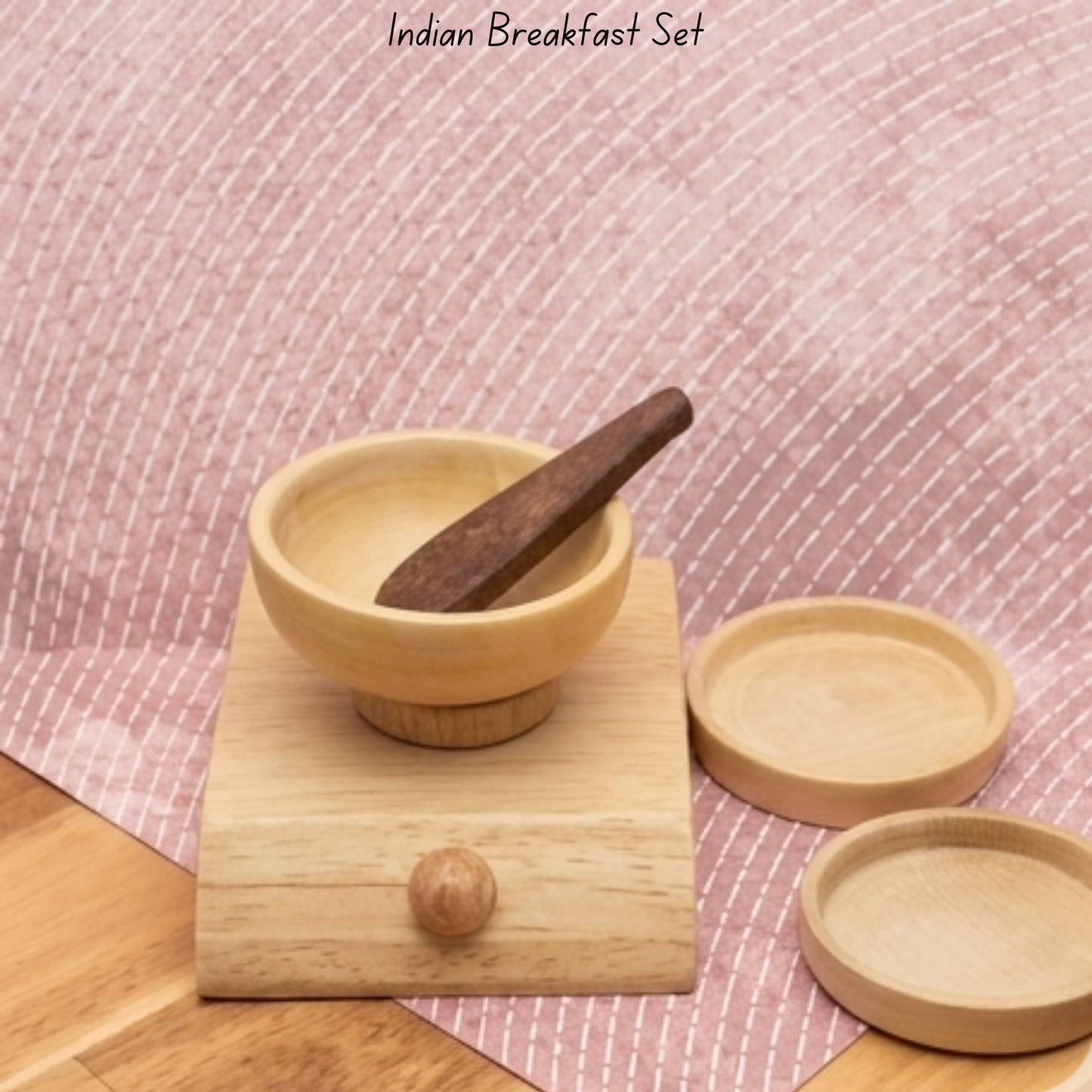 Close-up of wooden toy mortar and pestle from Indian breakfast pretend play set.